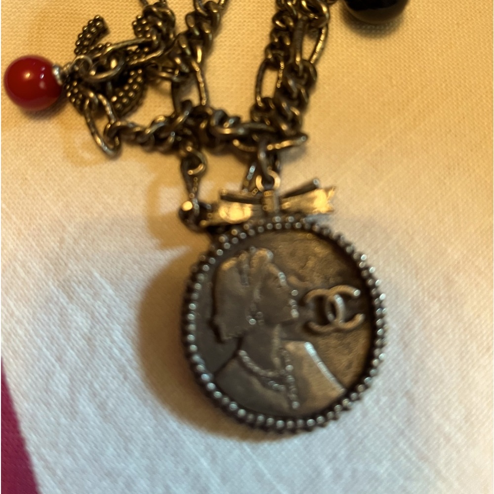 Chanel 2004 charm bracelet featuring Coco Chanel.